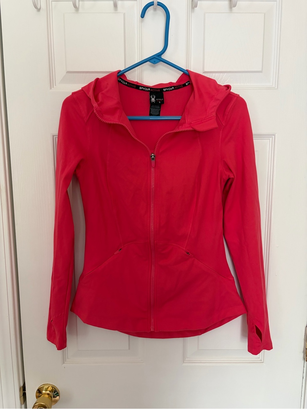 Spyder Active Women's Full-Zip Hooded Track Jacket.